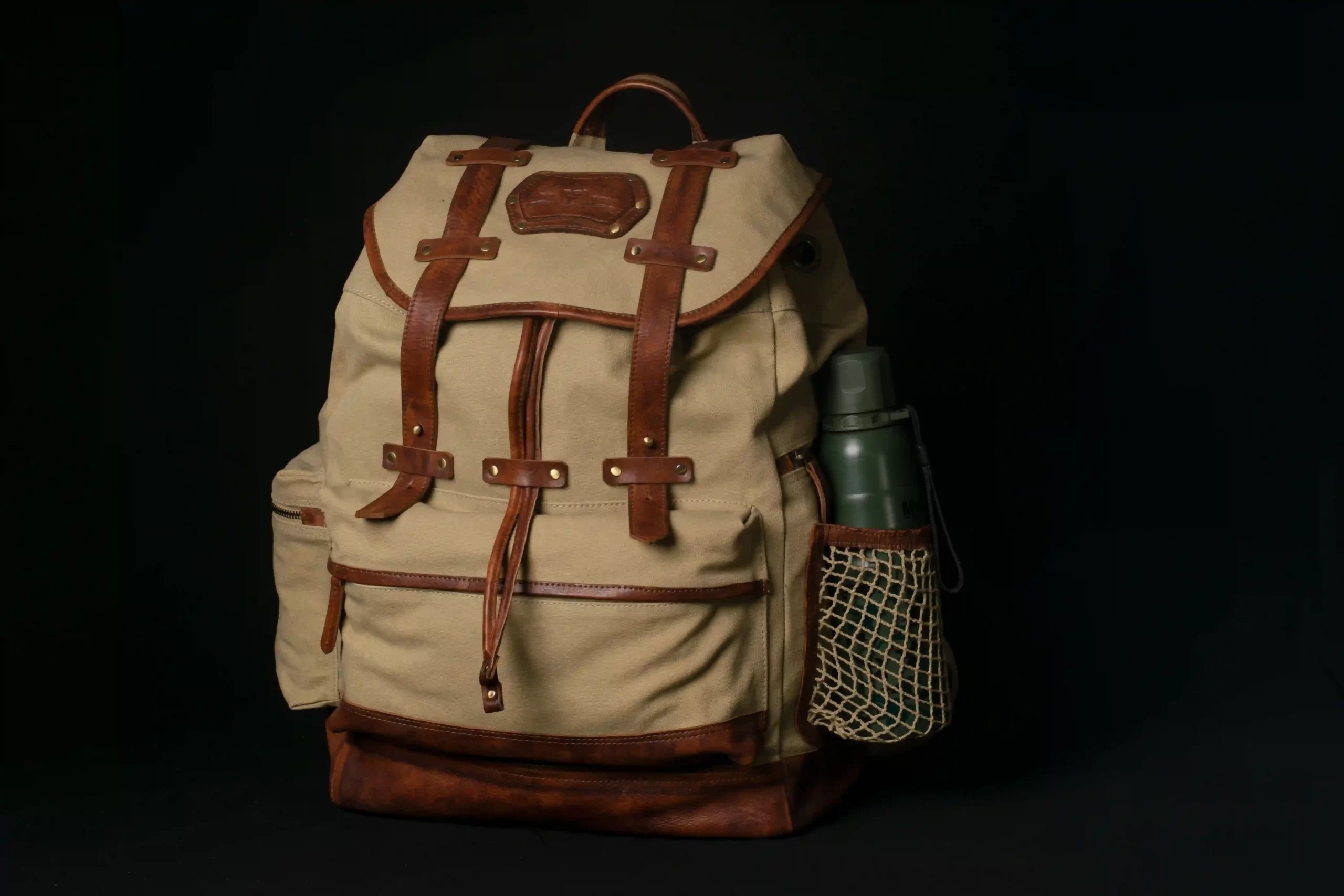 WASHED CANVAS LEATHER BACKPACK